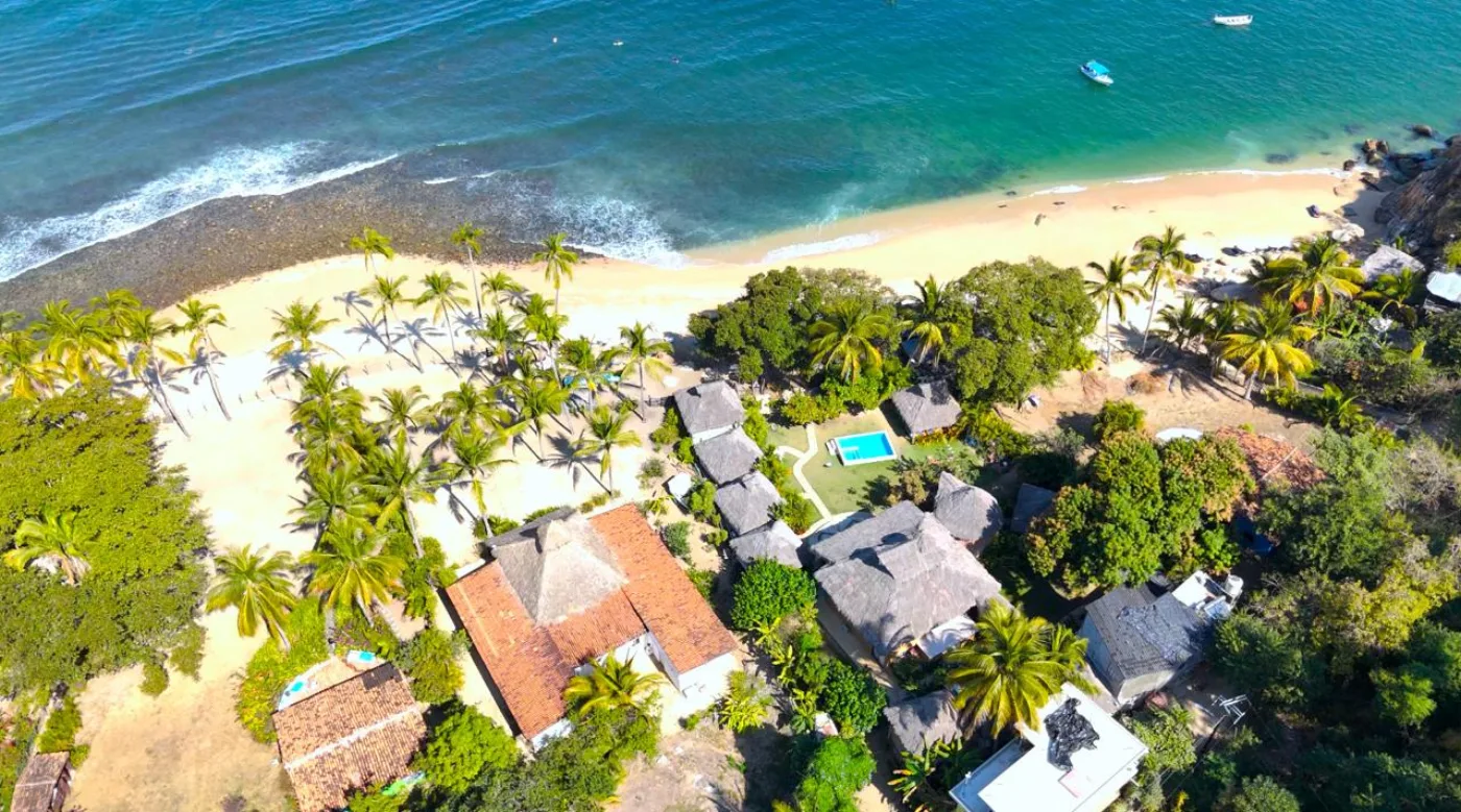Aerial view of Amaca Beach between jungle and sea
