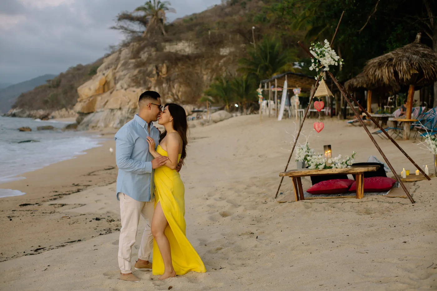 Couple enjoying a private beach moment at Amaca Beach